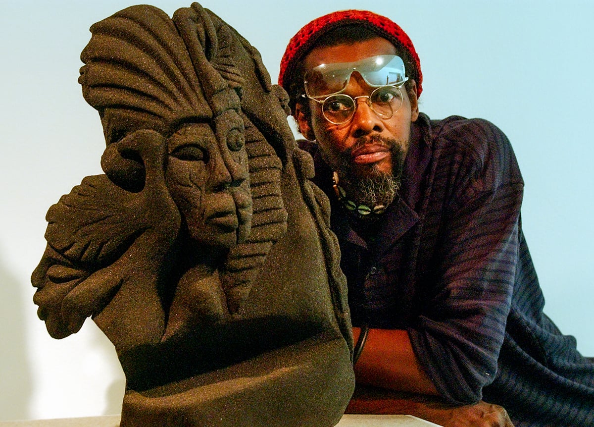 Lonnie Holley with one of his sculptures, Alabama self-taught artist