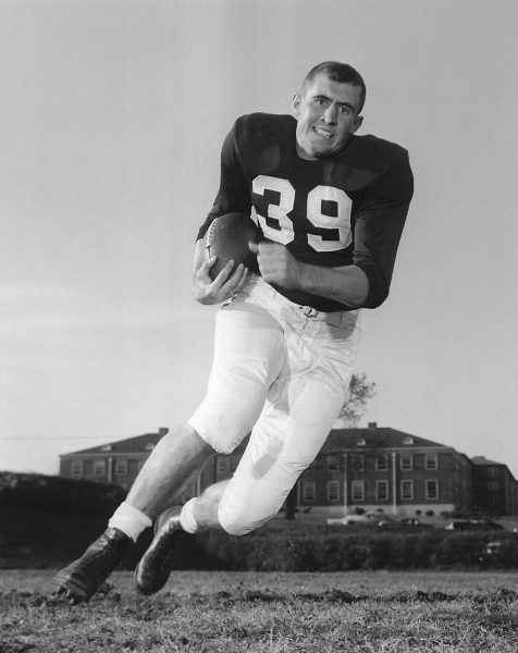 Action shot of football player Billy Atkins at Auburn University