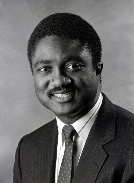 Black and white headshot of George Curry