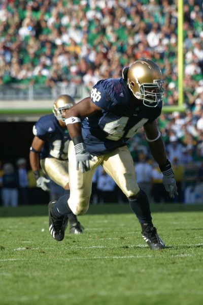 Justin Tuck playing at a University of Notre Dame football game.