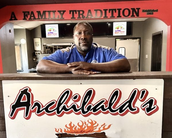 Woodrow Washington III pictured at counter of Archibald's Bar-B-Q restaurant
